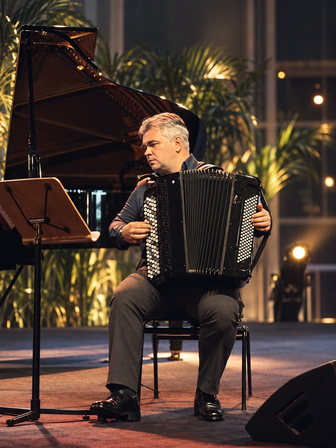 Aleks Farseev performing at Crossing Borders, Esplanade